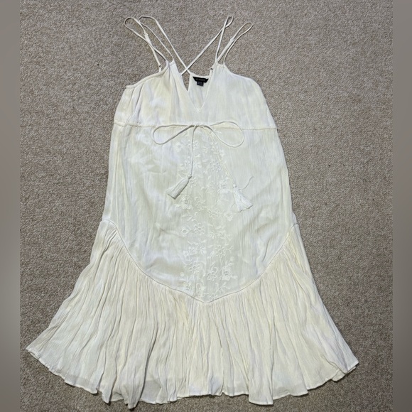 White Sleeveless Dress with Embroidered Details - Picture 1 of 6